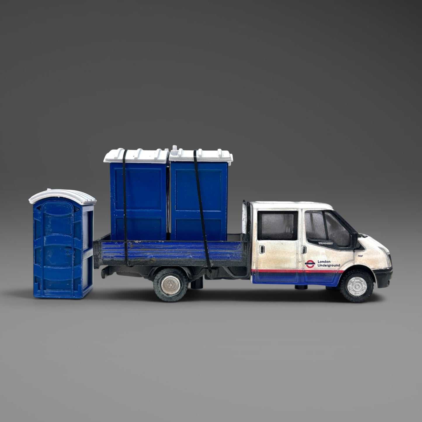 Oxford Diecast Ford Transit Dropside London Underground with Load - 1:76 Scale