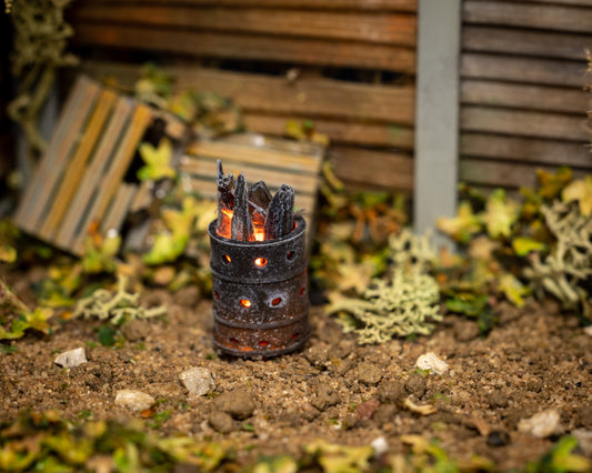 Incinerator with flickering flame effect